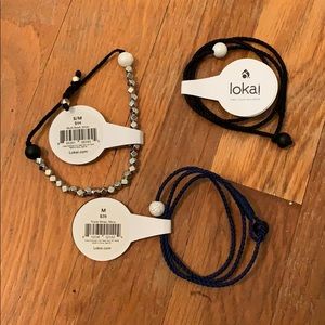 bundle of lokai bracelets! Silver, black, and navy